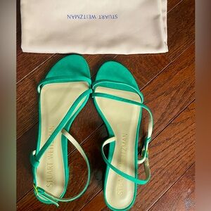 BRAND NEW STUART WEITZMAN
Flat block heel
Adjustable ankle strap